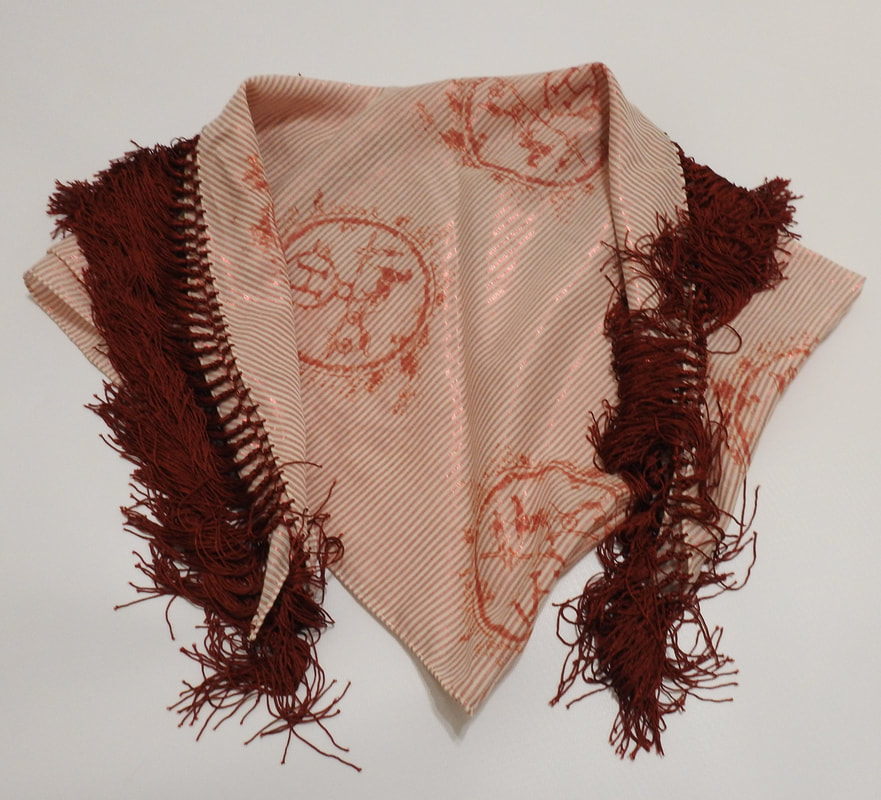 Picture of Hermes cotton scarf, Ex Libris Pointe Nomade, folded to show off the fringe