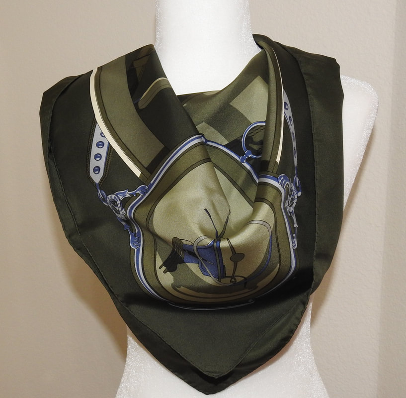 Picture of used Hermes 90cm silk scarf for sale, Moyeux, tied in a simple triangle knot