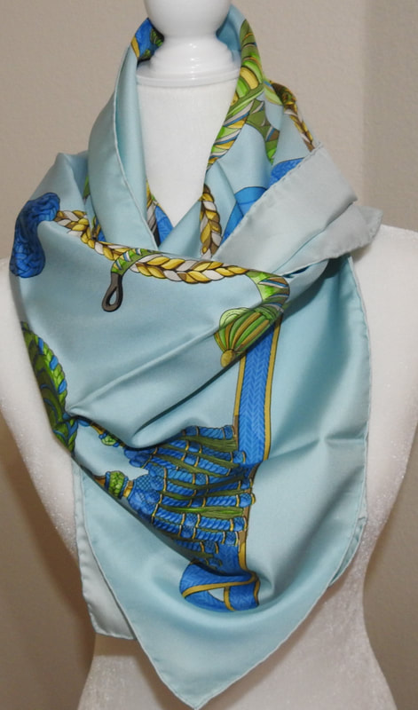 Picture of blue equestrian themed Hermes 90cm scarf, Frontaux et Cocardes