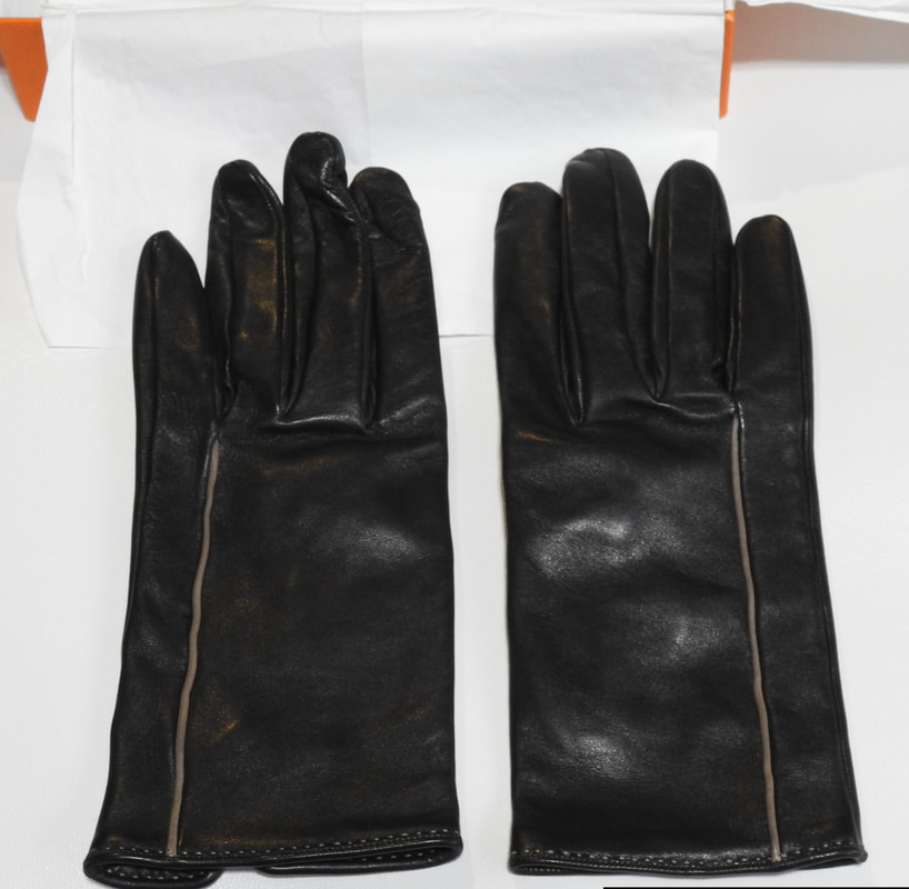 Picture of black leather gloves by Hermes, in ladies size 8.