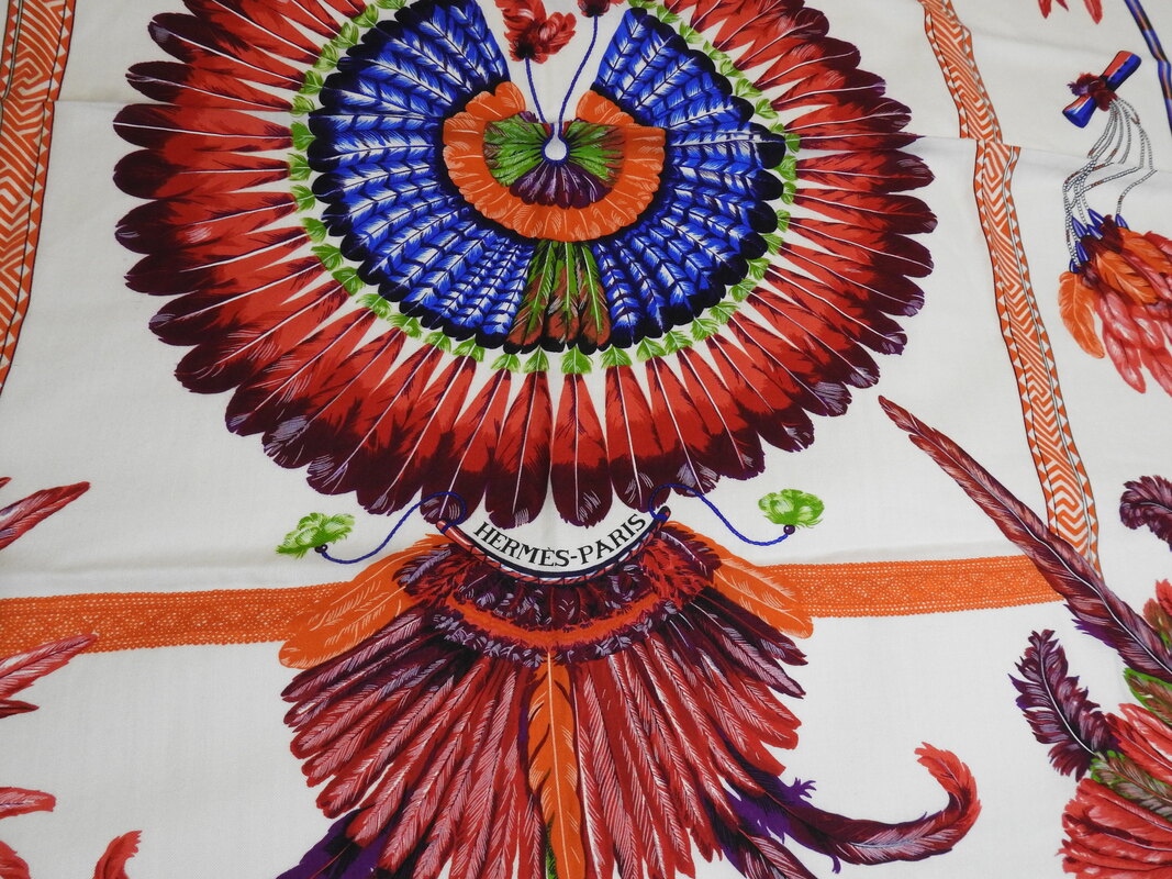 Close up picture of the Hermes brand appearing in a used Hermes 140cm silk and cashmere scarf Brazil