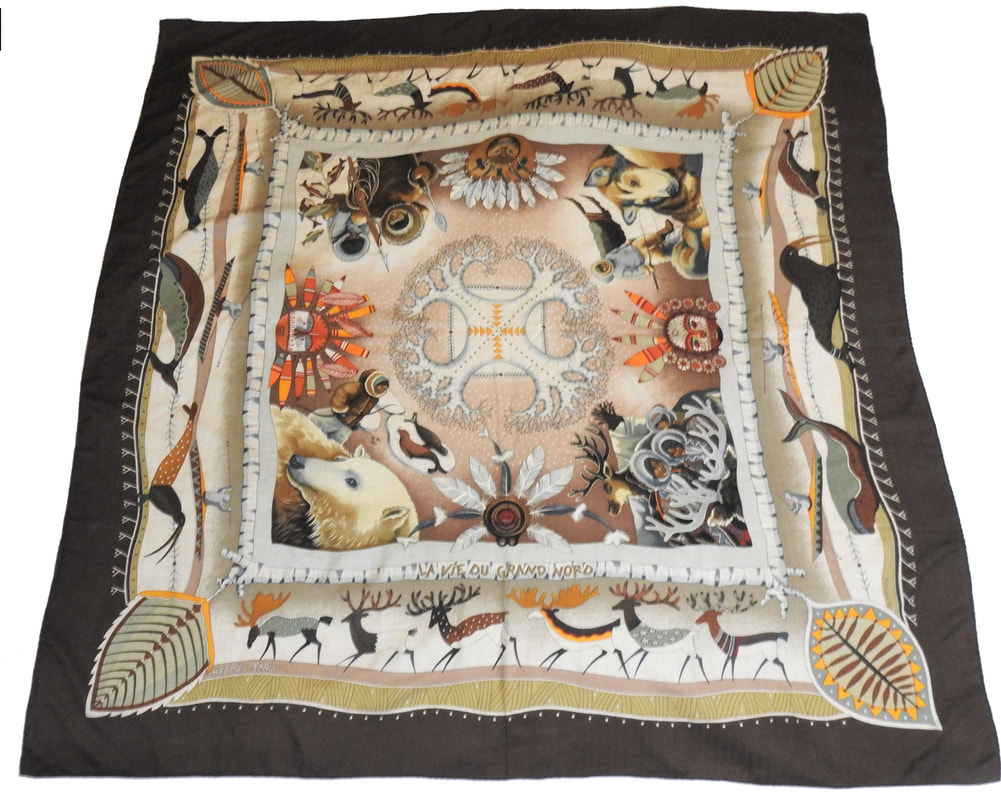 Picture of 140cm cashmere shawl by Aline Honore for Hermes. La Vie du Gran Nord was her first design. It features polar bears, huskies and life in the frozen north. Black and tan.