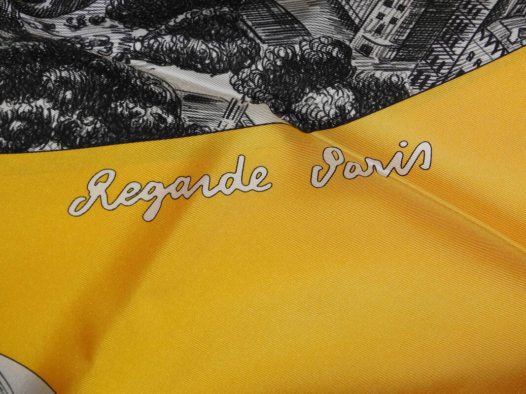 Close up picture of Regarde Paris, a vintage Hermes 90cm silk scarf designed by Bali Barret