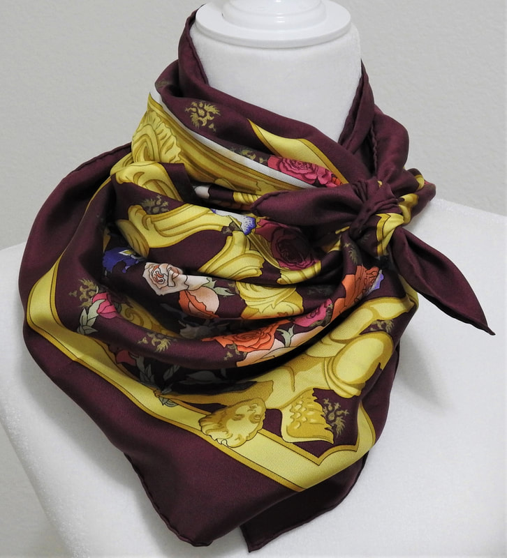 Picture of used Hermes 90cm silk scarf for sale. Roue Arriere du Carrosse Imperial de la Cour de Vienne. Tied in snail knot