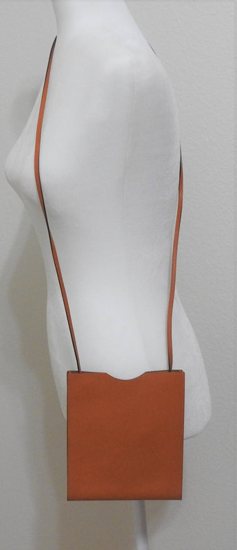 Picture of orange leather Hermes Onimaitou crossbody handbag