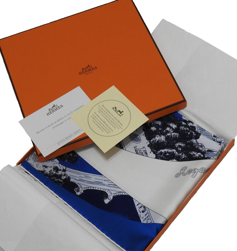 Picture of Regarde Paris, a pre-owned vintage Hermes 90cm silk scarf, in original Hermes orange box, packaged for gift delivery