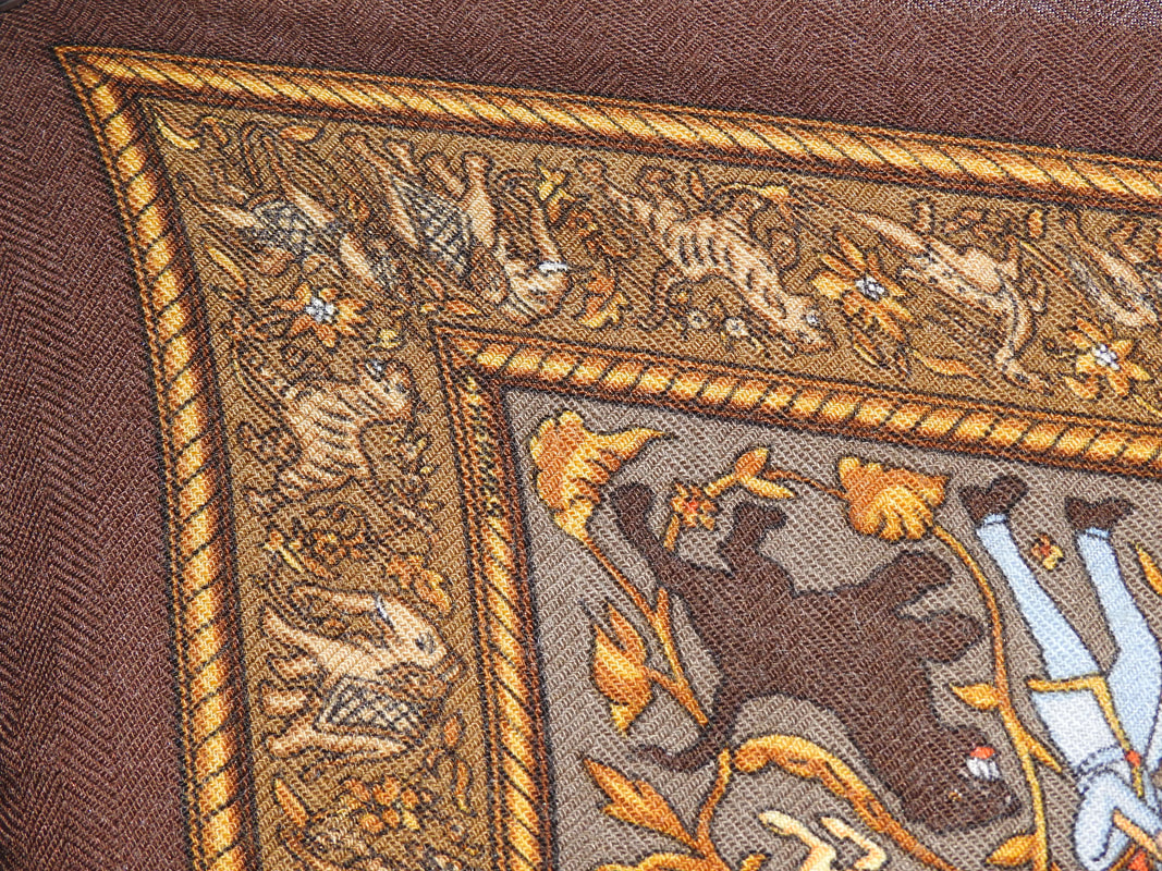 Close up Picture of copyright in used brown Hermes 90cm cashmere scarf for sale Chasse en Inde