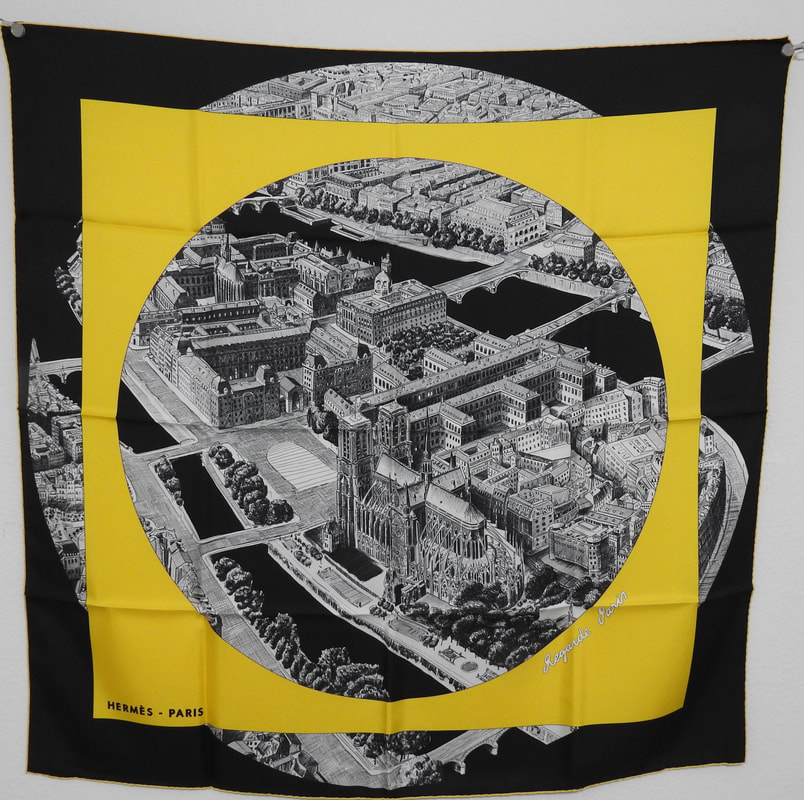 Picture of Regarde Paris, a vintage Hermes 90cm silk scarf designed by Bali Barret, yellow, black and white color, for sale
