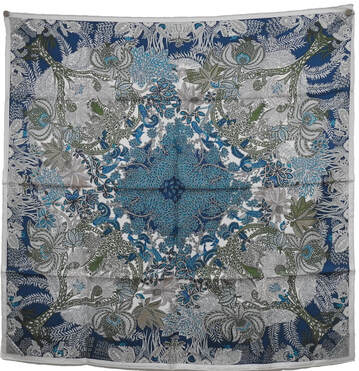 Picture of Maitres de la Foret, a 90cm silk Hermes scarf designed by Annie Faivre. Shades of teal and olive.