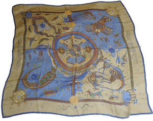 Picture of used Hermes 140cm silk mousseline scarf, Reve d'Australie, released in 1999 and designed by Zoe Pauwels. Blue and brown