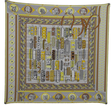Picture of Colliers et Chiens, a 90cm silk wash Hermes scarf. An adaptation of Colliers de Chiens, this includes lovable dogs on the border. Tan, yellow and grey.