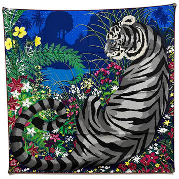 Picture of Tyger Tyger, a 90cm silk scarf designed by Alice Shirley for Hermes. A grey tiger lies in a pink, yellow and white floral field overlooking a blue lake. Features Wiliam Blake's poem