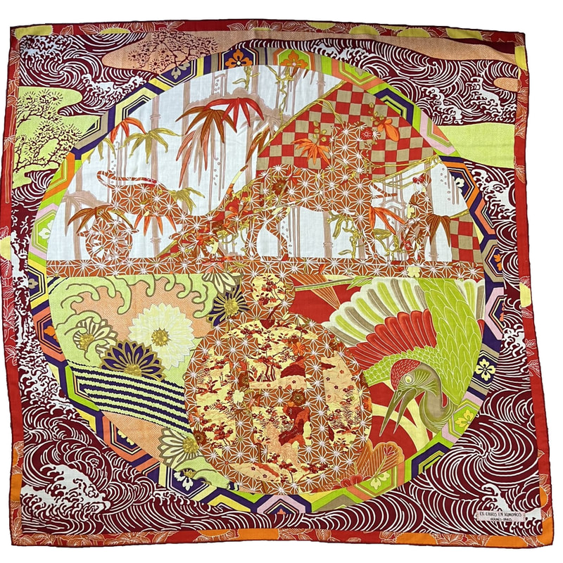 Picture of Ex Libris en Kimonos, a 140cm Hermes cashmere shawl designed by the artistic group Anamorphee. Featuring dark red waves, lime green birds, orange trees and the Hermes duc carriage