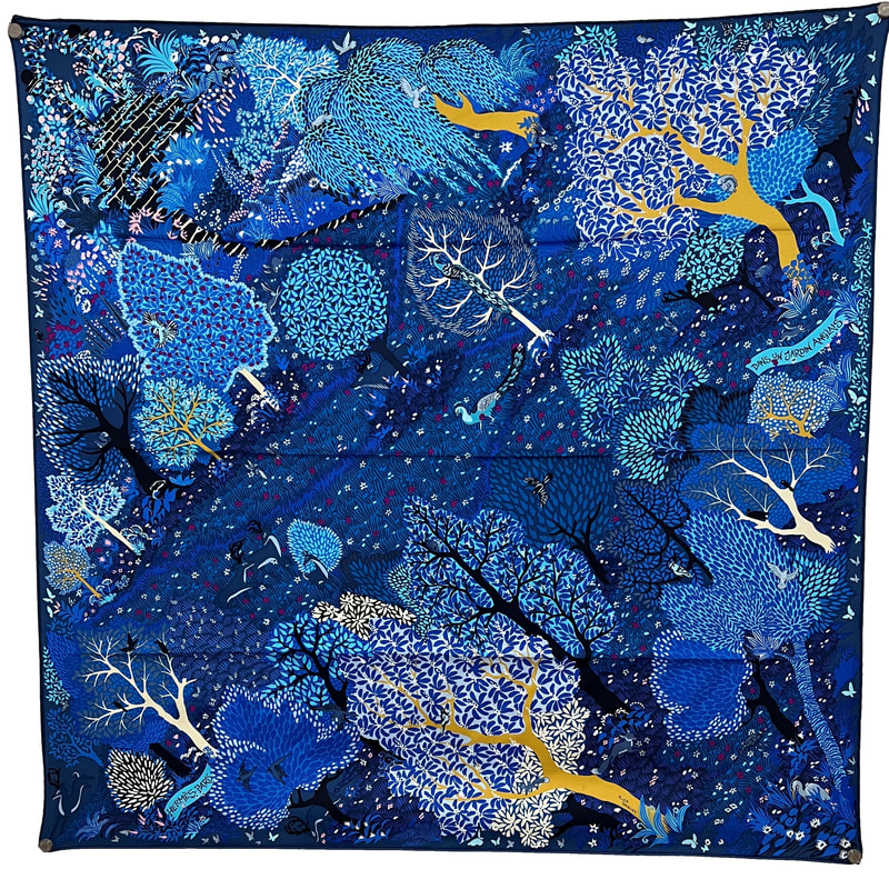 Picture of Dans un Jardin Anglais, a 90cm Hermes silk scarf designed by Alice Shirley. Blue, mustard yellow, white and pink