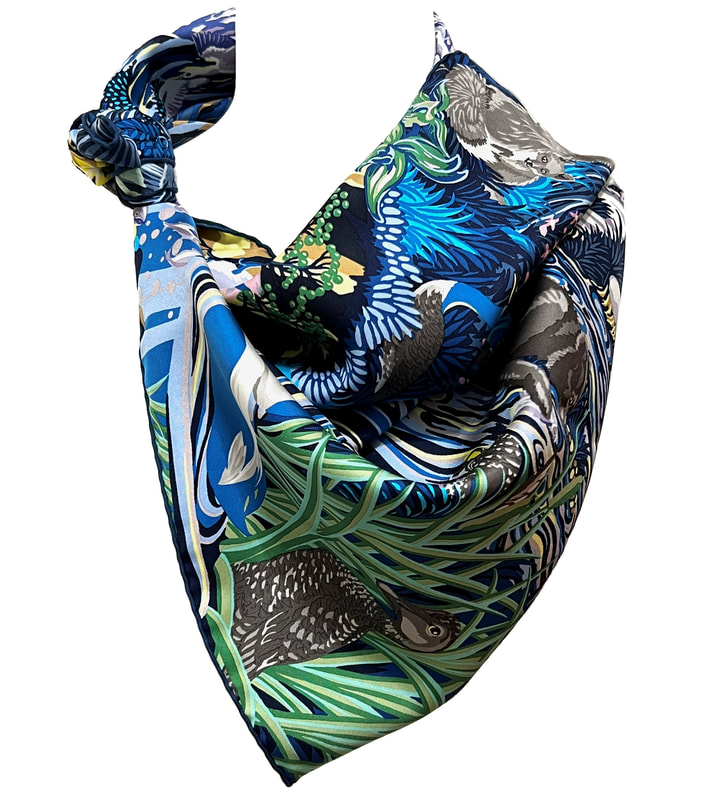 Picture of Into the Canadian Wild, a 90cm Hermes silk scarf designed by Alice Shirley. Colorway 03.