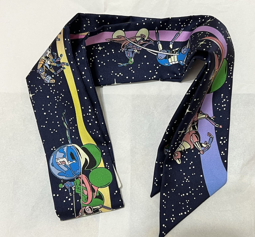 Picture of Space Derby, a used Hermes silk twilly scarf designed by Ugo Bienvenu, for sale