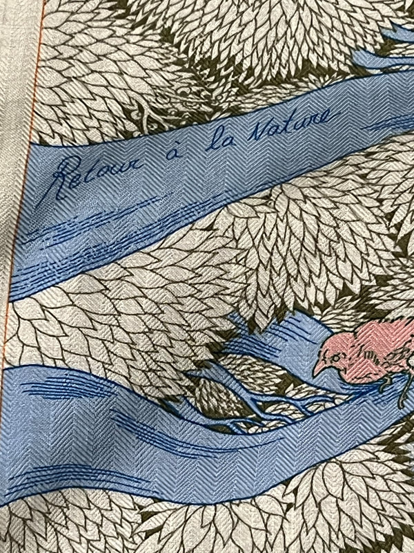 Close up picture of Retour a la Nature scarf title, from a 140cm Hermes cashmere shawl for sale in 2000. Designed by Zoe Pauwels, it celebrates Australian wildlife