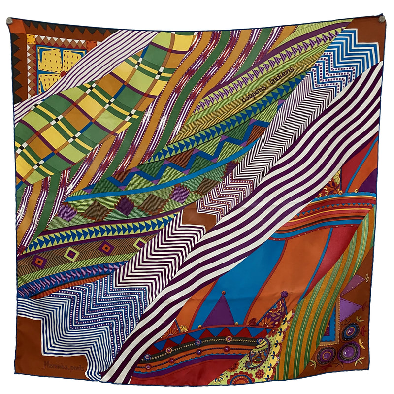 Picture of Coupons Indiens, a 2008 Hermes silk scarf designed by Aline Honore. Turquoise, rust, purple and chartreuse