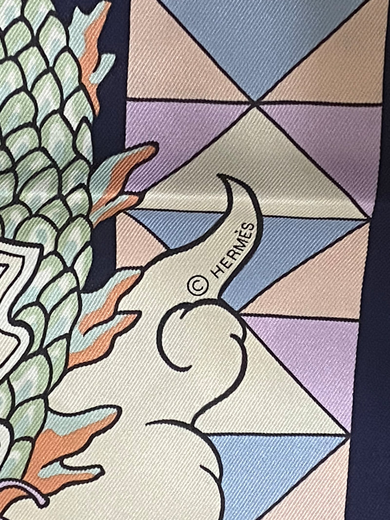 Close up picture of the Hermes copyright on 70cm L'Epopee scarfHermes scarf Kelly en Caleche