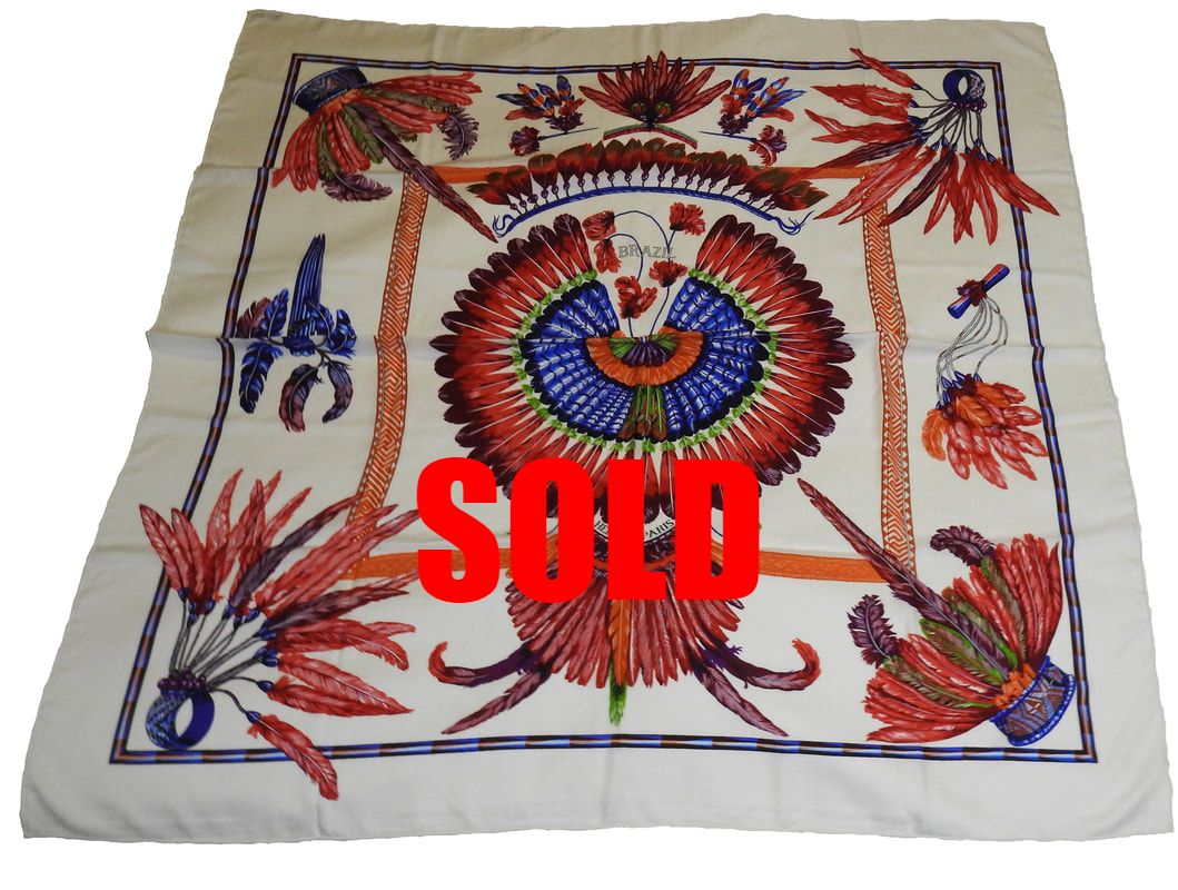 Picture of used Hermes 140cm silk and cashmere scarf for sale. Brazil designed by Toutsy. White with red, blue, green, orange, purple feathers