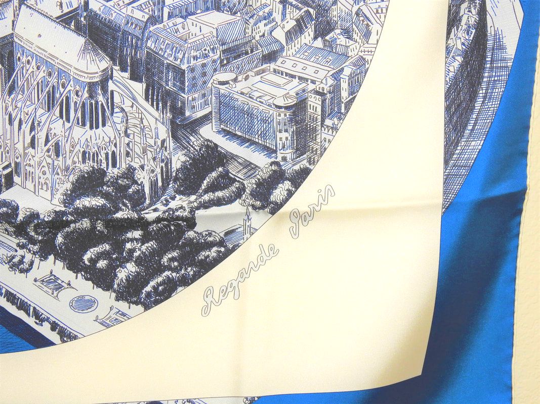 Close up picture of Regarde Paris, a vintage Hermes silk scarf designed by Bali Barret