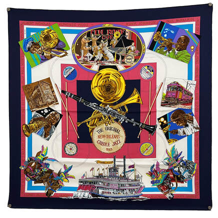 New Orleans Creole Jazz is a 90cm silk scarf designed by Loic Dubigeon for Hermes. Navy, rose and royal blue borders. Features images of New Orleans steamboats, and the names of famous Jazz musicians