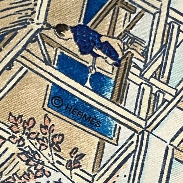 Close up Picture of Hermes copyright on Les Artisans, a 90cm blue Hermes silk scarf for sale