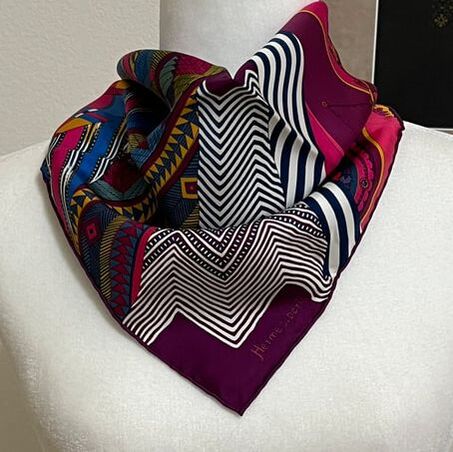 Picture of Coupons Indiens, a purple, white, pink and blue 45cm silk pocket square from Hermes.