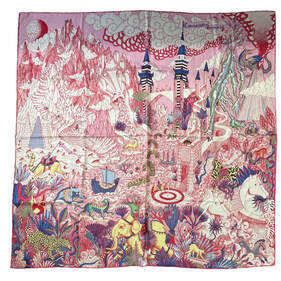 Picture of Cosmographia Universalis, a 140cm cashmere silk scarf designed for Hermes by Jan Bajtlik. Pink and white and blue with pops of yellow