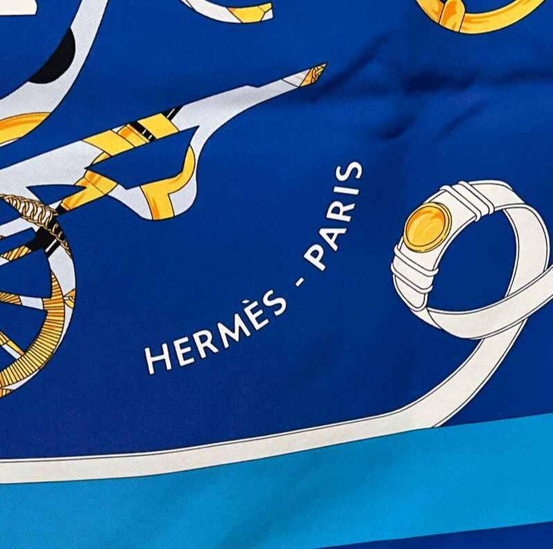 Close up picture of Tout en Carre, a vintage Hermes 90cm silk scarf designed by Bali Barret