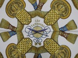 Close up picture of Les Tambours, a vintage Hermes silk scarf designed by J Metz